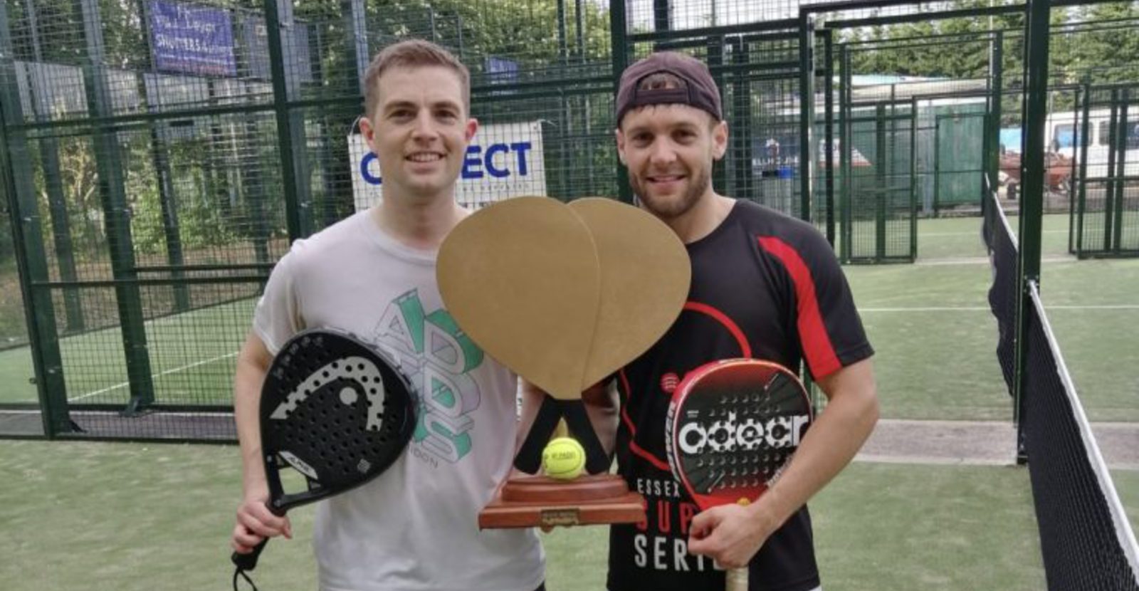 Elliot Selby (left) and partner Jon Matthews, a fellow squash player who loves padel, claim a trophy at Maldon